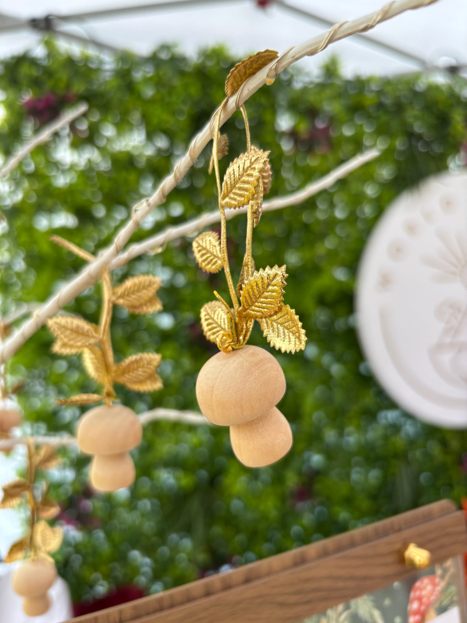 Wooden mushroom ornament with gold leaf